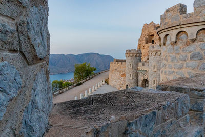 View of old ruin building against sky