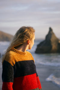 Rear view of woman looking at sea