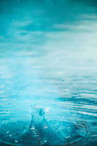 Close-up of water splashing in swimming pool