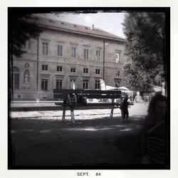 Woman standing in city