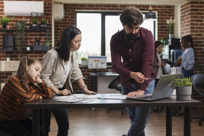 Business colleagues working at office