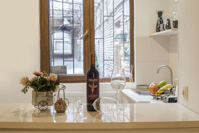 Flower vase on table at home