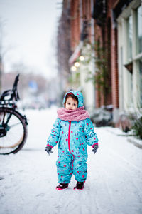 Portrait of cute girl in snow