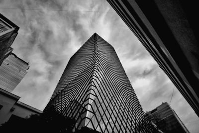 Low angle view of modern buildings against sky