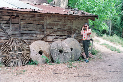 Old mill, millstones and the girl