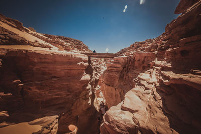 Scenic view of rocky mountains against sky