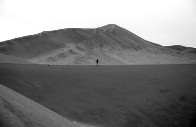 Scenic view of desert against clear sky