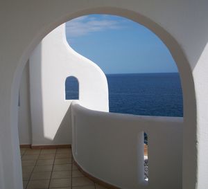 View of calm sea against blue sky