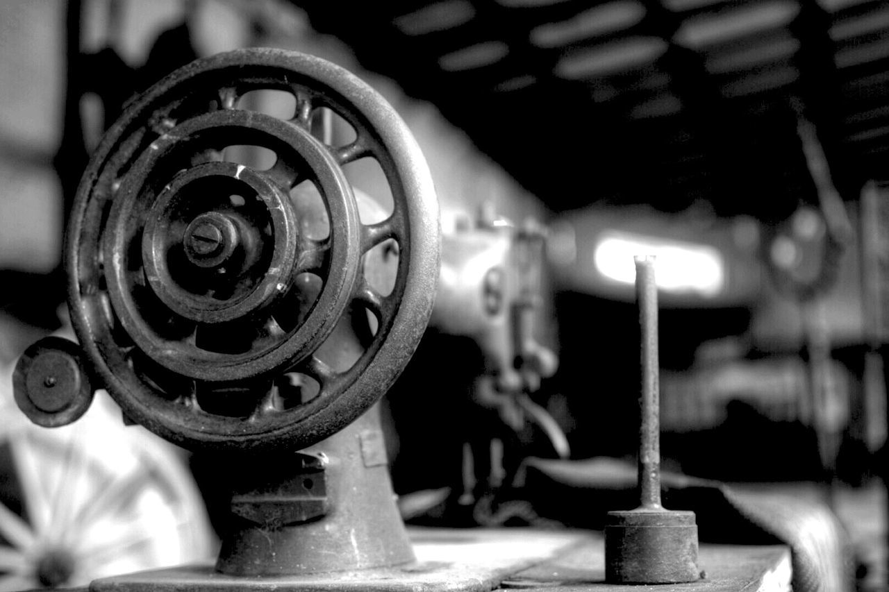 metal, focus on foreground, close-up, indoors, machine part, technology, machinery, metallic, selective focus, old-fashioned, equipment, part of, industry, retro styled, old, no people, day, transportation, man made object, music