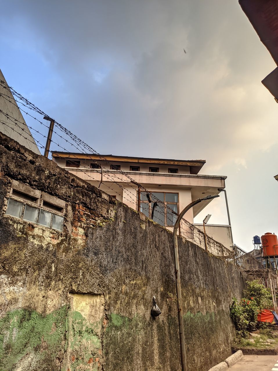 LOW ANGLE VIEW OF OLD BUILDING