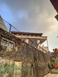 Low angle view of old building against sky