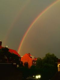 Rainbow over buildings