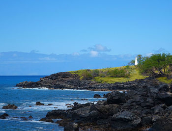 Scenic view of sea against clear blue sky