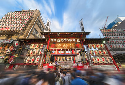 View of traditional building against cloudy sky