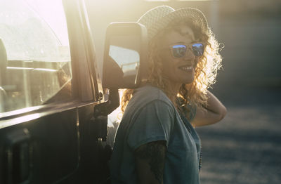 Man wearing sunglasses looking at camera