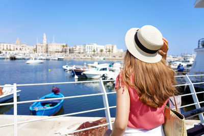 Rear view of woman looking at sea