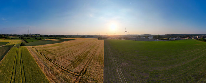 Scenic view of agricultural field against sky at night