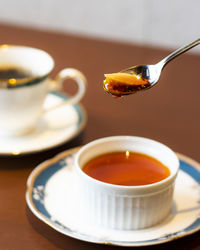 Close-up of coffee cup on table