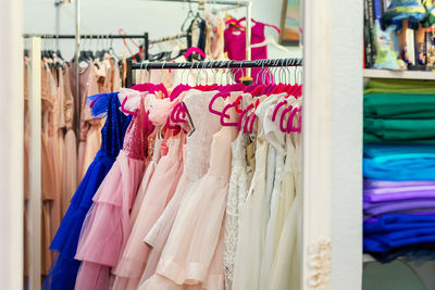 Clothes hanging on rack at store