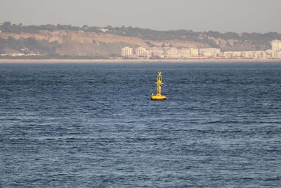 Buoy floating at tagus river