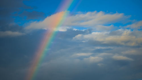 Low angle view of rainbow in sky