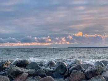 Scenic view of sea against sky during sunset