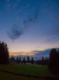 Scenic view of landscape against cloudy sky