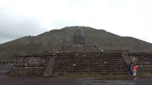 View of building against cloudy sky