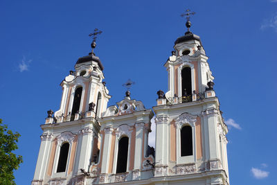 Low angle view of building against blue sky