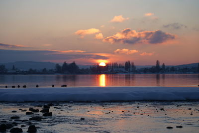 Scenic view of sea against sky during sunset