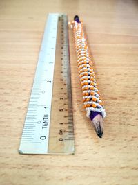 Close-up of pencil and ruler on table
