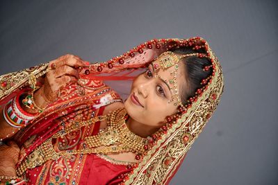 Close-up of smiling young bride at home 