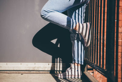 Low section of young woman