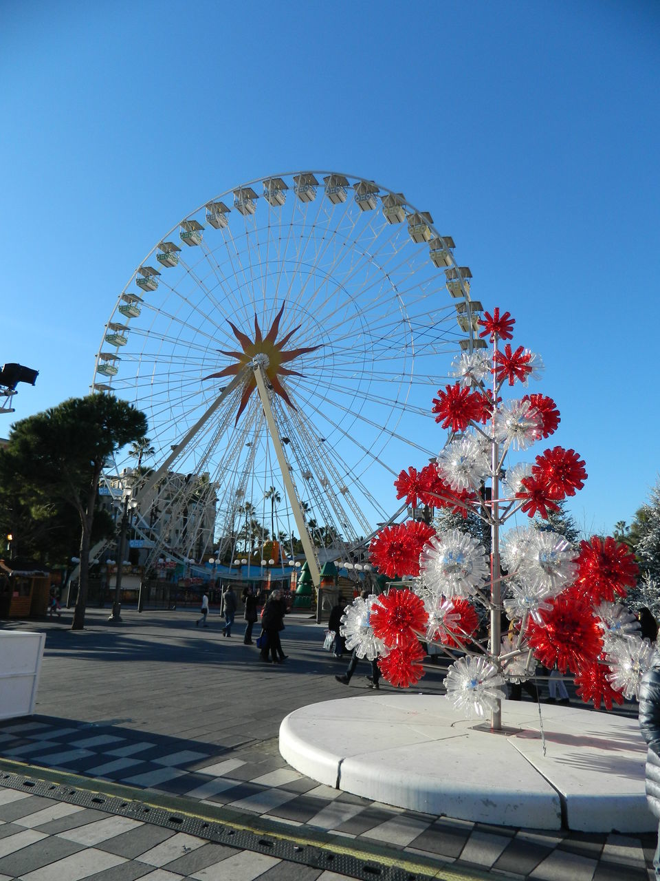 LOW ANGLE VIEW OF FERRIS WHEEL AGAINST SKY