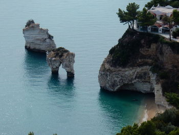 High angle view of rocks in sea