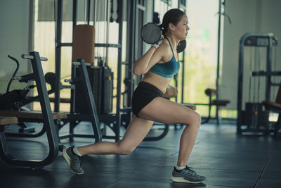 Woman exercising in gym