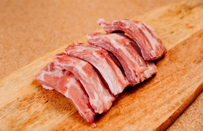 Close-up of chopped meat on cutting board