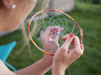 Close-up of hand holding ball