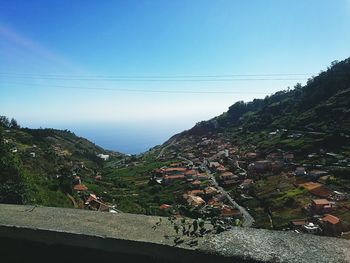 Scenic view of landscape against blue sky