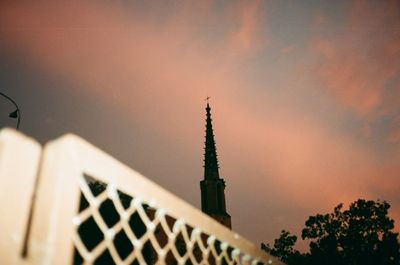 Low angle view of building against sky during sunset