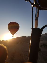 Hot air balloon flying over land