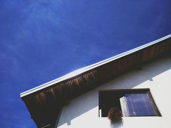 Low angle view of built structure against blue sky