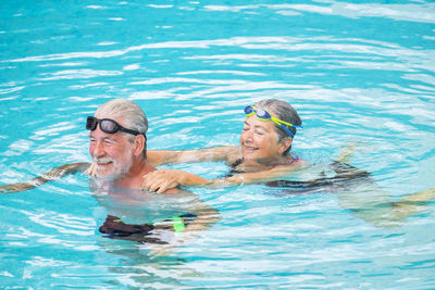 Man swimming in pool
