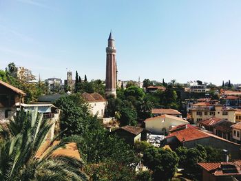 High angle view of buildings and tower against sky