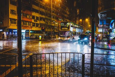 Wet city street during rainy season at night