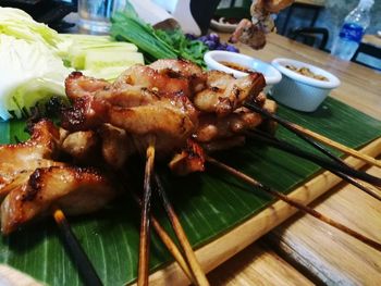 Close-up of meat on barbecue grill