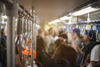 Rear view of people in train