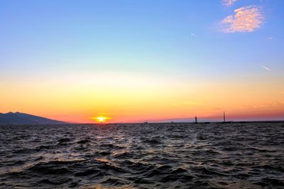 Scenic view of sea against sky during sunset