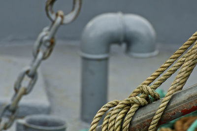 Close-up of rope tied on metal