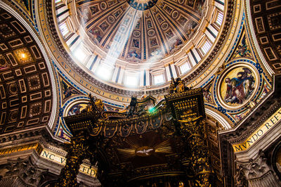 Low angle view of ornate ceiling of building